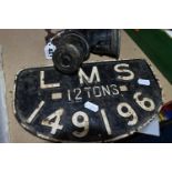 A LMS WAGON PLATE AND A BICYCLE LAMP, comprising a London, Midland and Scottish Railway cast iron