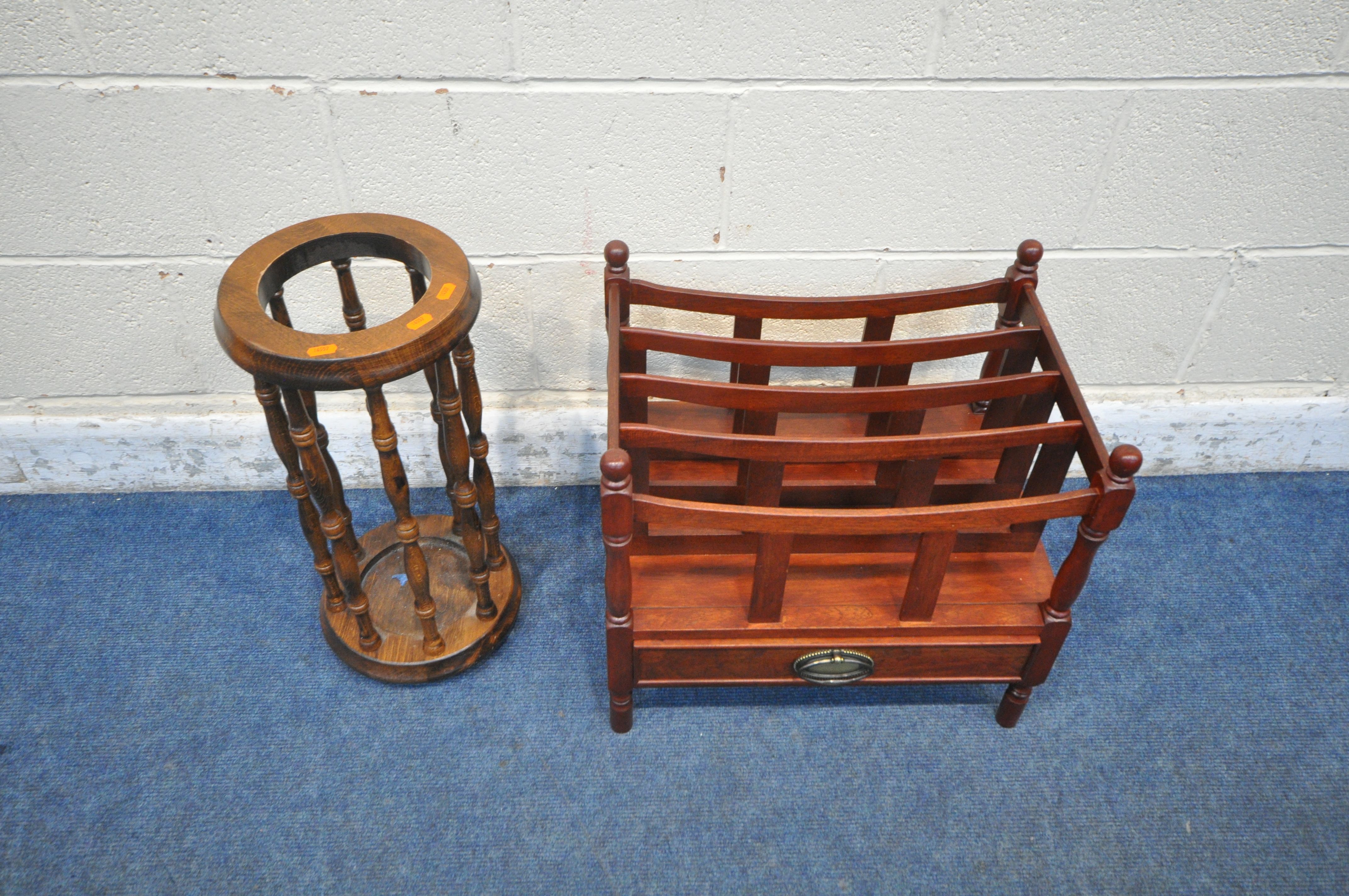 A REPRODUCTION MAHOGANY MAGAZINE RACK, with a single drawer, along with a stick stand (condition