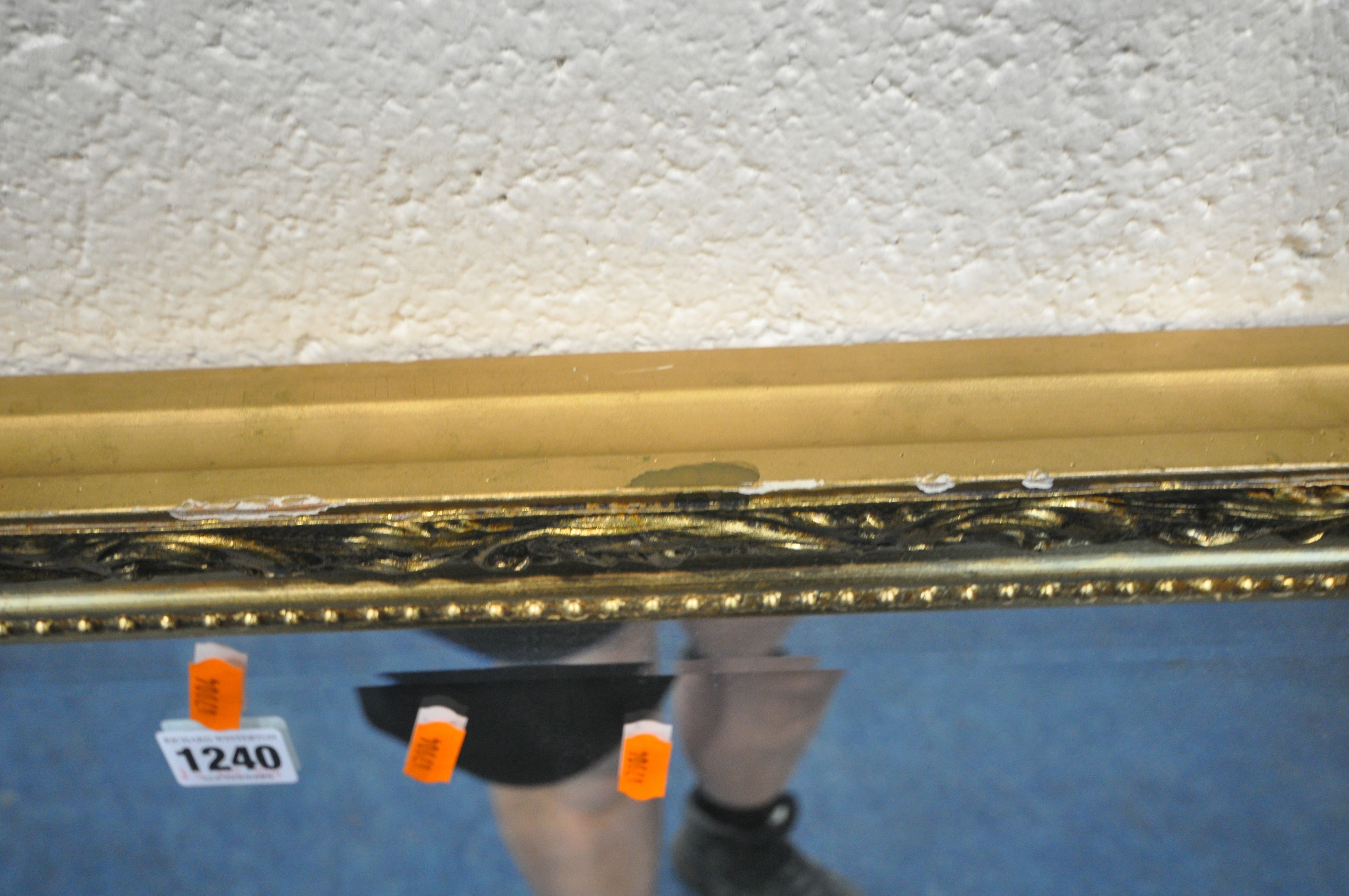 A RECTANGULAR GILT FRAMED BEVELLED EDGE WALL MIRROR, 114cm x 87cm (condition report: some small - Image 3 of 3