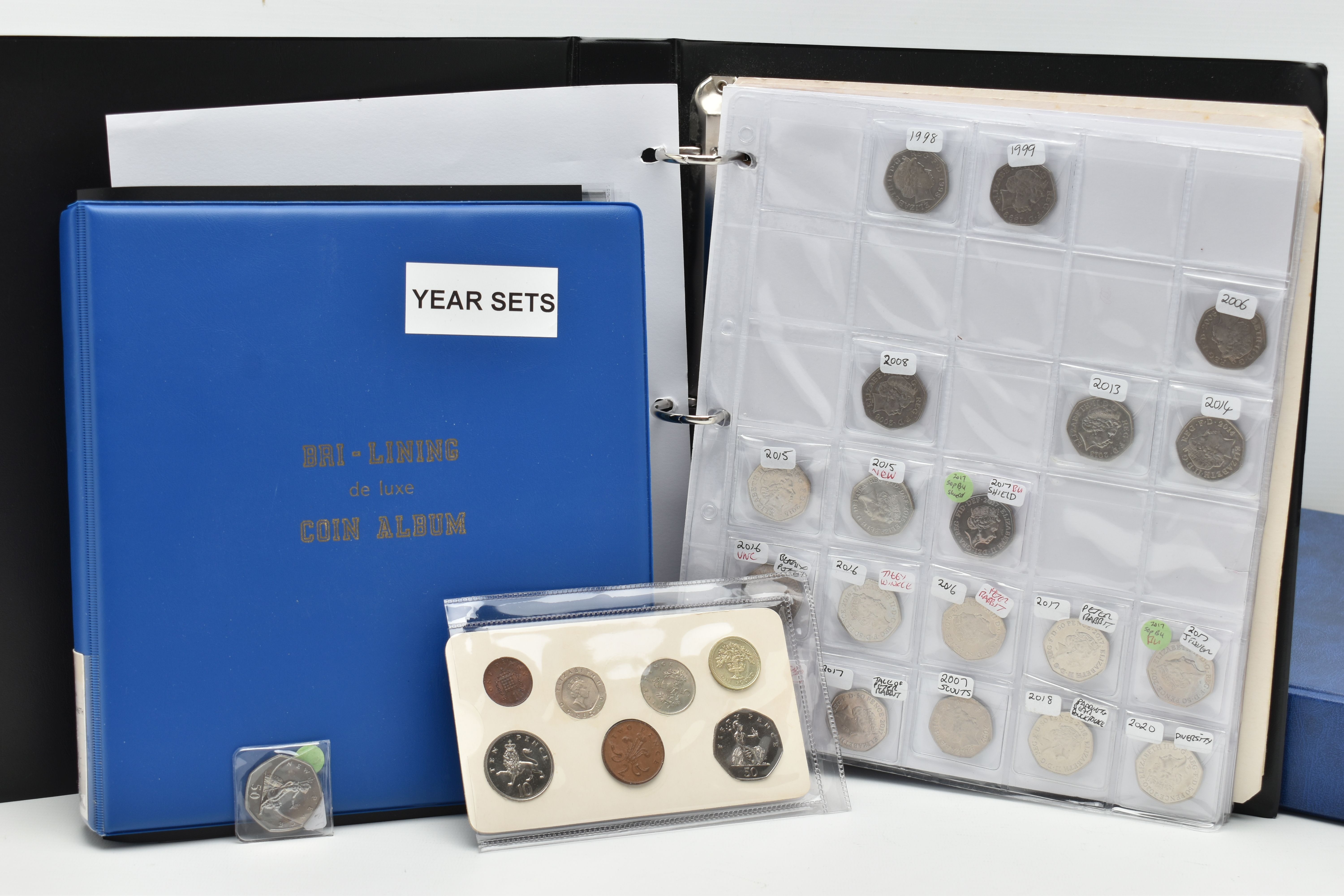 TWO COIN ALBUMS OF UK COINAGE FROM 1974-2018, to include Two Pound coins, Fifty Pence coins, with