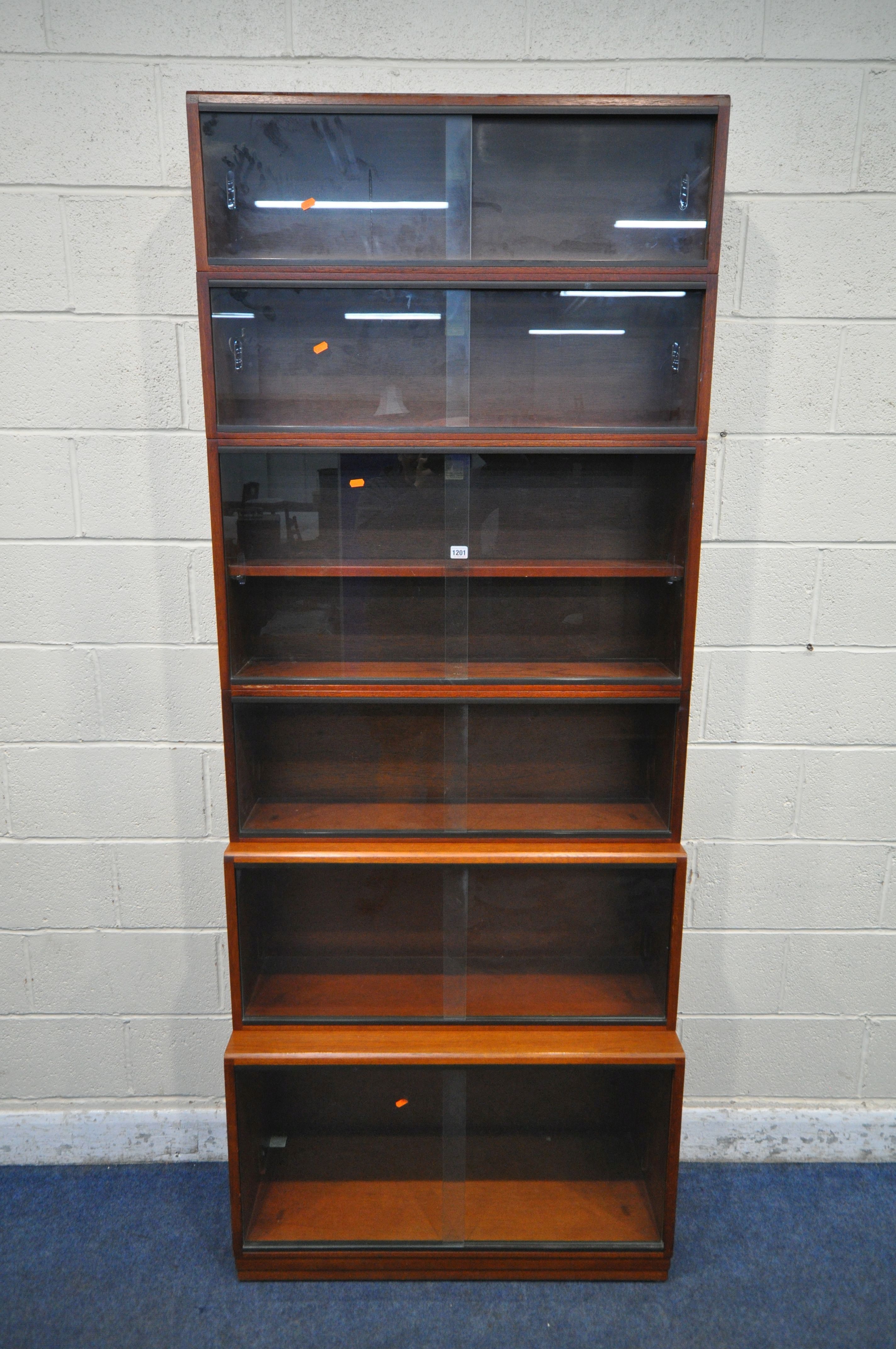 A 20TH CENTURY SIMPLEX SIX SECTION MAHOGANY STACKING BOOKCASE, all sections with double sliding