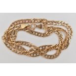 A 9CT GOLD DOUBLE CURB LINK CHAIN, fitted with a spring clasp, approximate length 510mm,