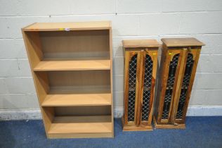 AN IKEA BOOKCASE, with two adjustable shelves, width 76cm x depth 31cm x height 124cm, along with