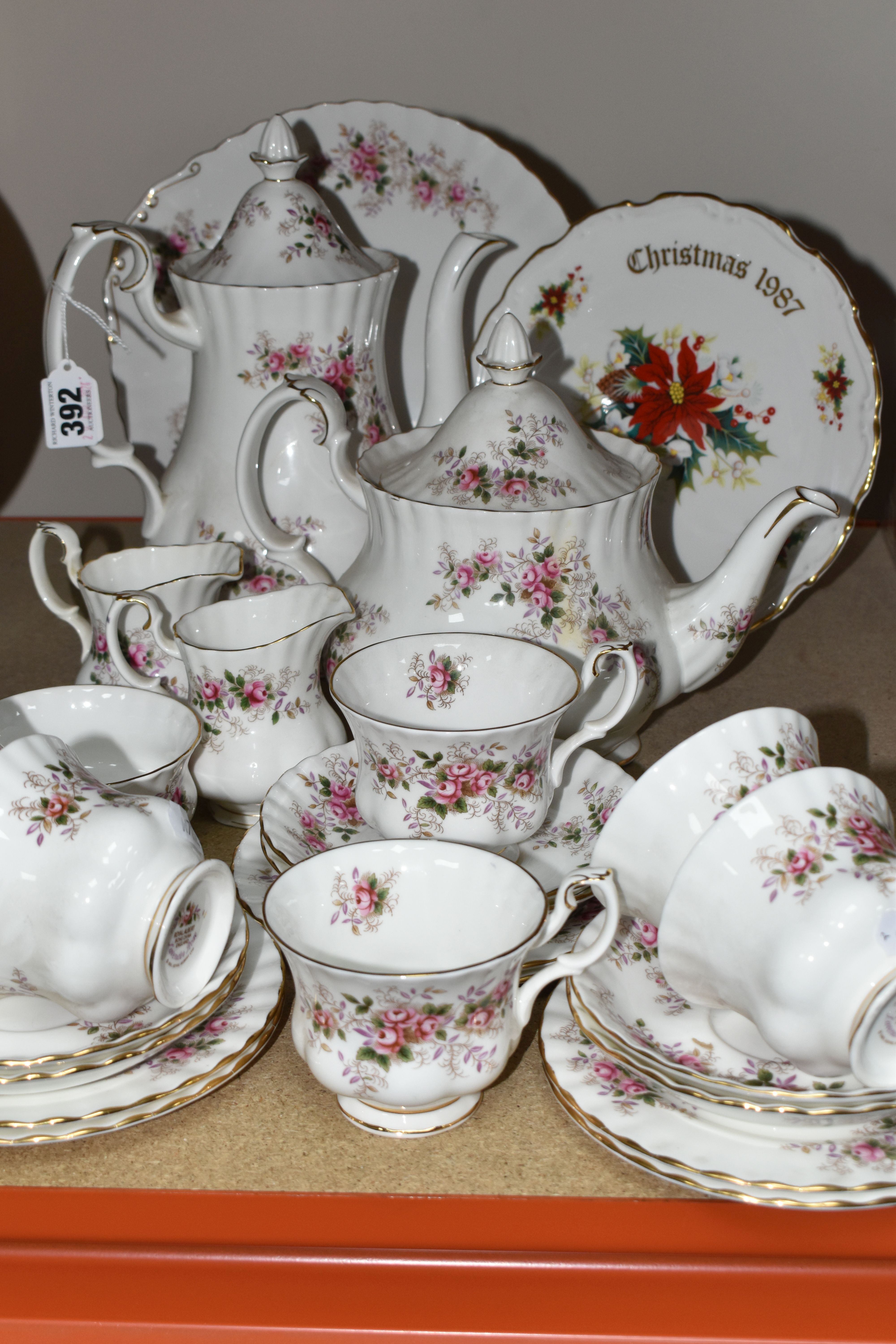 A ROYAL ALBERT 'LAVENDER ROSE' PATTERN TEA SET, comprising a coffee pot, teapot, cake plate, two