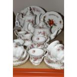 A ROYAL ALBERT 'LAVENDER ROSE' PATTERN TEA SET, comprising a coffee pot, teapot, cake plate, two