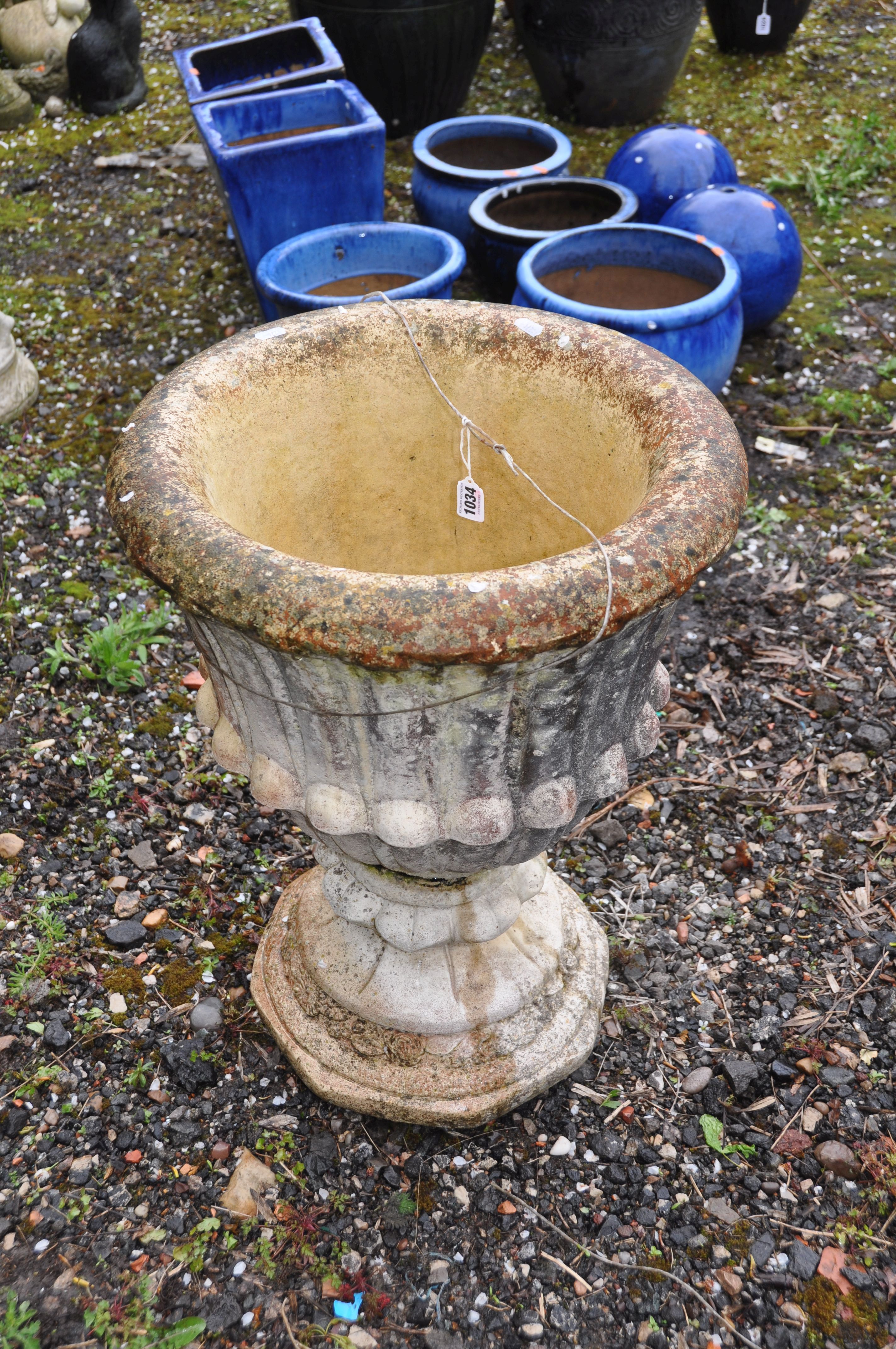 A WEATHERED COMPOSITE GARDEN URN with fluted detail to bowl height 63cm constructed in two pieces - Image 2 of 2