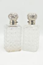 A PAIR OF LATE VICTORIAN SILVER MOUNTED SQUARE HOBNAIL CUT GLASS DECANTERS, the hinged covers
