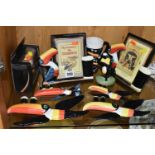 A GROUP OF MODERN GUINNESS COLLECTABLES, comprising two Enesco picture frames, a small standing