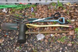 A SELECTION OF GARDEN TOOLS including a marquee mallet, forks, spades etc