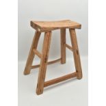 AN ELM STOOL, on square tapered legs, united by stretchers, width 46cm x depth 31cm x height 50cm (