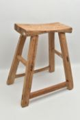 AN ELM STOOL, on square tapered legs, united by stretchers, width 46cm x depth 31cm x height 50cm (