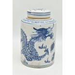 A 19TH CENTURY CHINESE PORCELAIN CYLINDRICAL JAR AND COVER DECORATED IN BLUE AND WHITE WITH A FOUR
