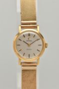 AN 18CT GOLD LADY'S OMEGA WATCH, WITH CASE, the circular silver coloured face with baton markers,