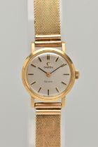AN 18CT GOLD LADY'S OMEGA WATCH, WITH CASE, the circular silver coloured face with baton markers,