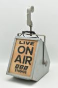 A VINTAGE BBC STUDIOS 'LIVE ON AIR' HANGING LIGHT IN A GREY PAINTED METAL HOUSING, the panel