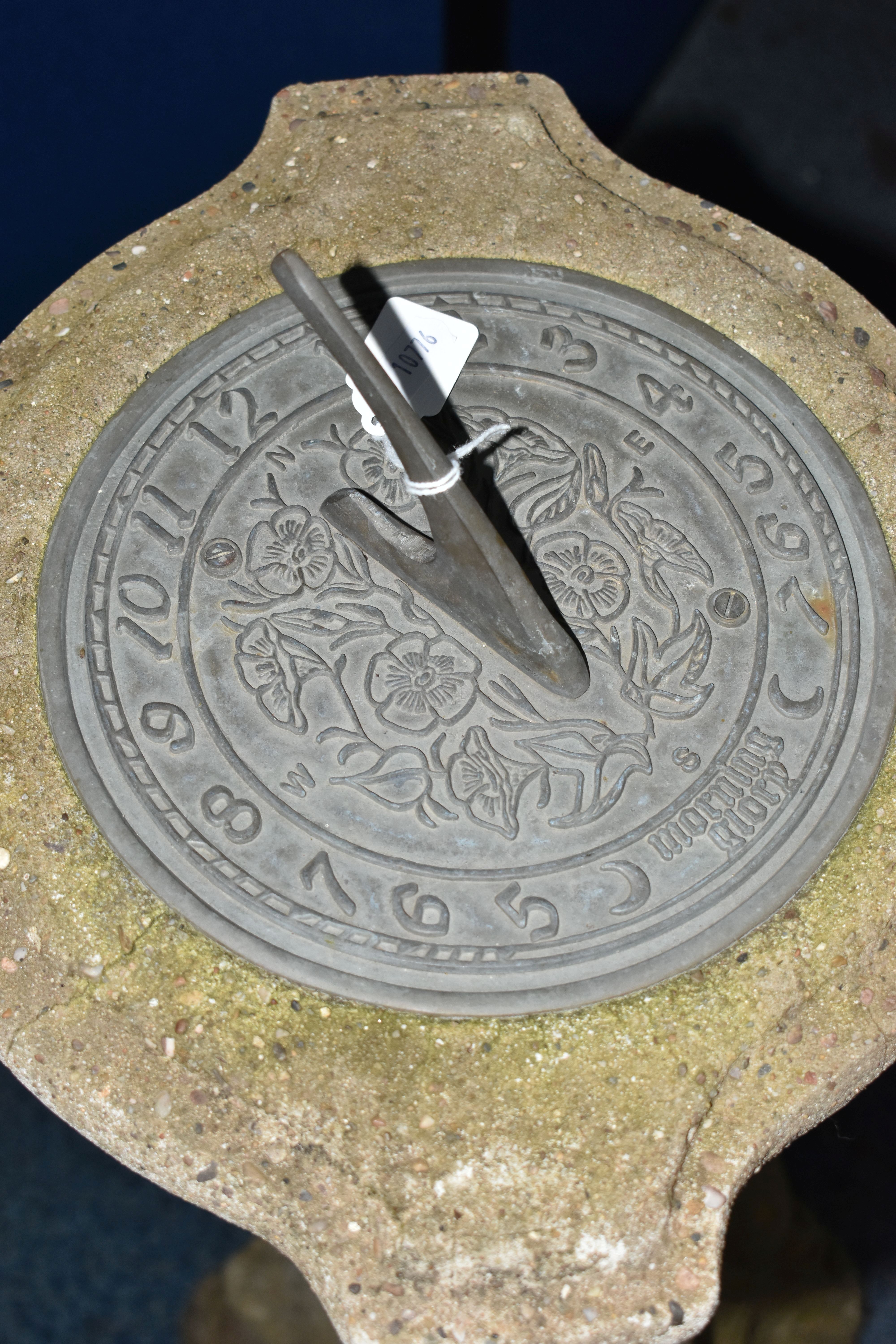 A WEATHERED COMPOSITE SUN DIAL, the top is raised on a seated putti holding an urn aloft, diameter - Image 3 of 10