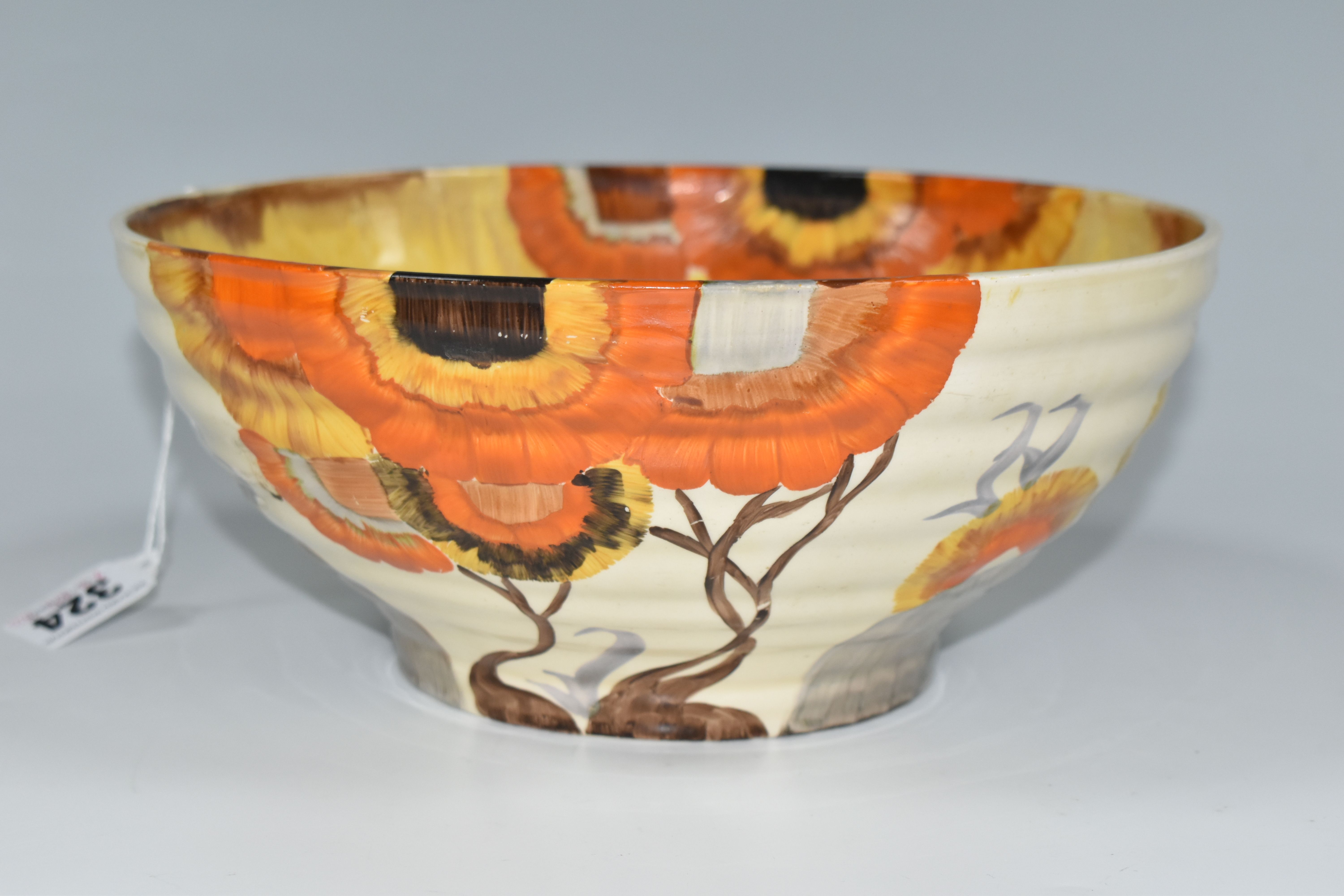 A CLARICE CLIFF BIZARRE BOWL, in Rhodanthe pattern, the ribbed bowl painted with flowers in autumnal - Image 2 of 6