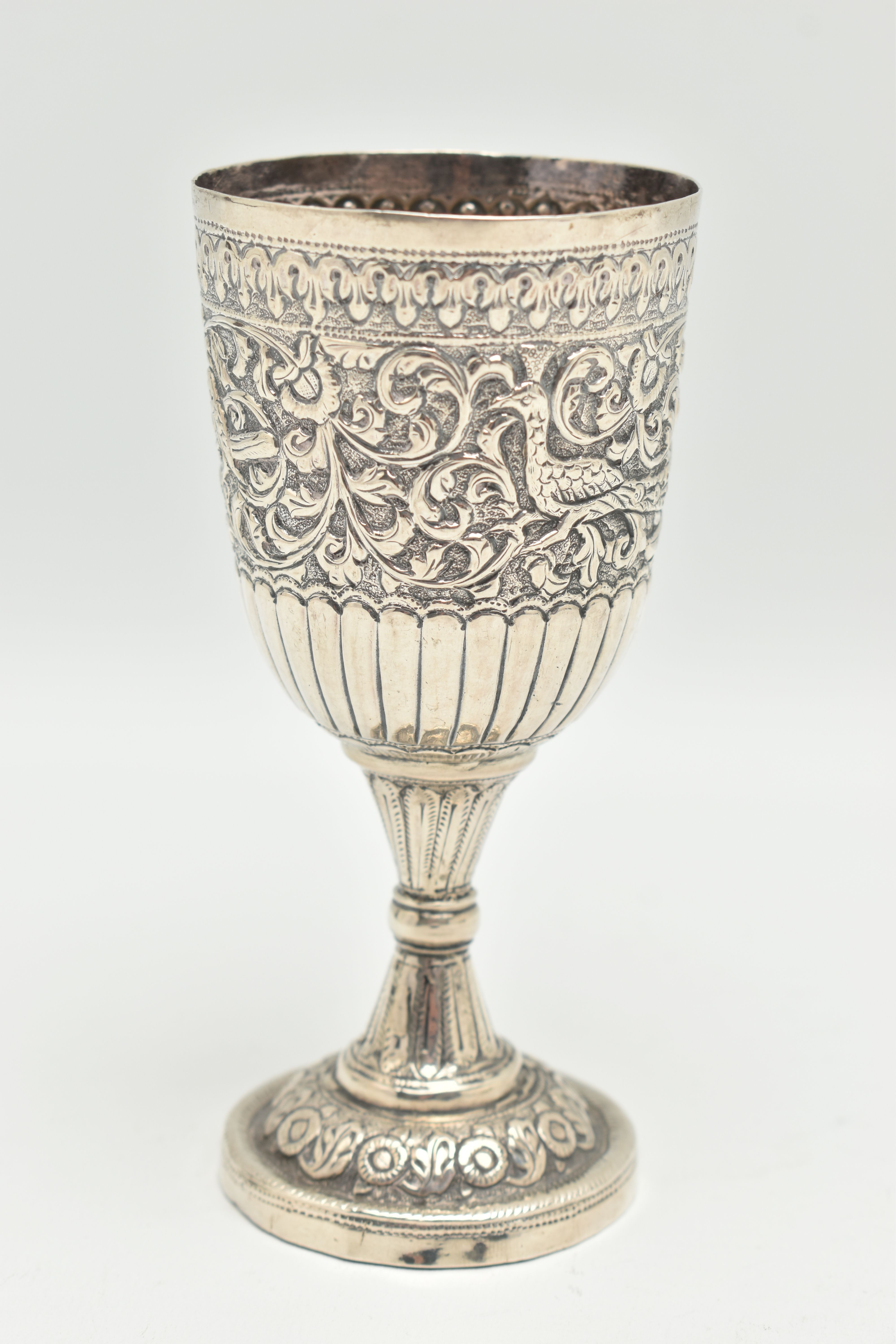 A LATE 19TH CENTURY INDIAN WHITE METAL GOBLET, repoussé decorated with foliate scrolls and birds, - Image 3 of 6