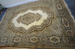 A PRADO KASHAN SUPER RUG, with a beige field, central medallion, repeating foliate patterns and a