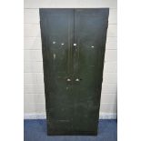 VICKERS ARMSTRONG, AN INDUSTRIAL GREEN DOUBLE DOOR METAL CABINET, with five adjustable shelves,
