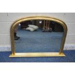 A GILT FRAMED ARCHED OVERMANTEL MIRROR, width 108cm x height 76cm (condition report: general signs