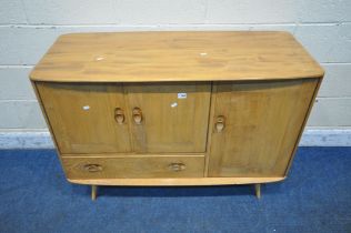 LUCIAN ERCOLANI, ERCOL, A MID CENTURY ELM AND BEECH SIDEBOARD, fitted with three cupboard doors