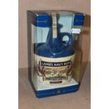 ONE BOTTLE OF LAMB'S NAVY RUM in a ceramic HMS Warrior Decanter, 40% vol. 750ml, seal intact, boxed
