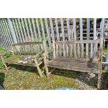 TWO MODERN WEATHERED WOODEN SLATTED GARDEN BENCHES widths 121 and 152cm respectively (some losses