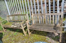 TWO MODERN WEATHERED WOODEN SLATTED GARDEN BENCHES widths 121 and 152cm respectively (some losses