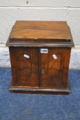 A SMALL 19TH CENTURY WALNUT AND INLAID TABLE TOP DOUBLE DOOR CABINET, enclosing three drawers with