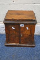 A SMALL 19TH CENTURY WALNUT AND INLAID TABLE TOP DOUBLE DOOR CABINET, enclosing three drawers with