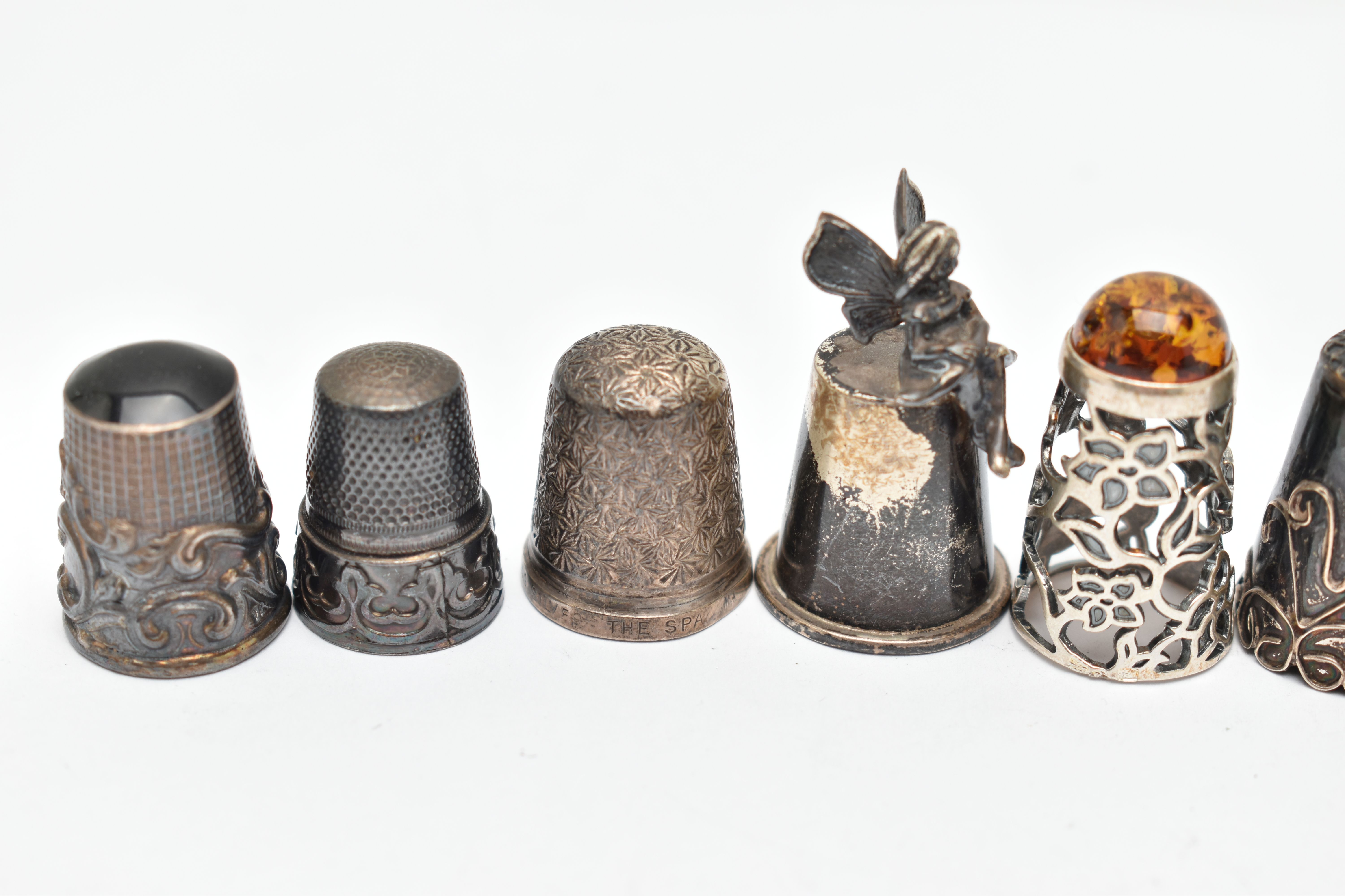 A BAG OF WHITE METAL THIMBLES, various designs and patterns, some set with semi-precious stone - Image 8 of 10