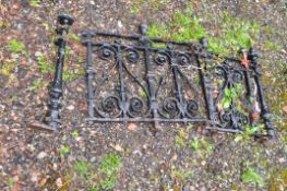A VICTORIAN CAST IRON BALUSTRADE in two sections with two posts height 70cm length approx. 140cm (