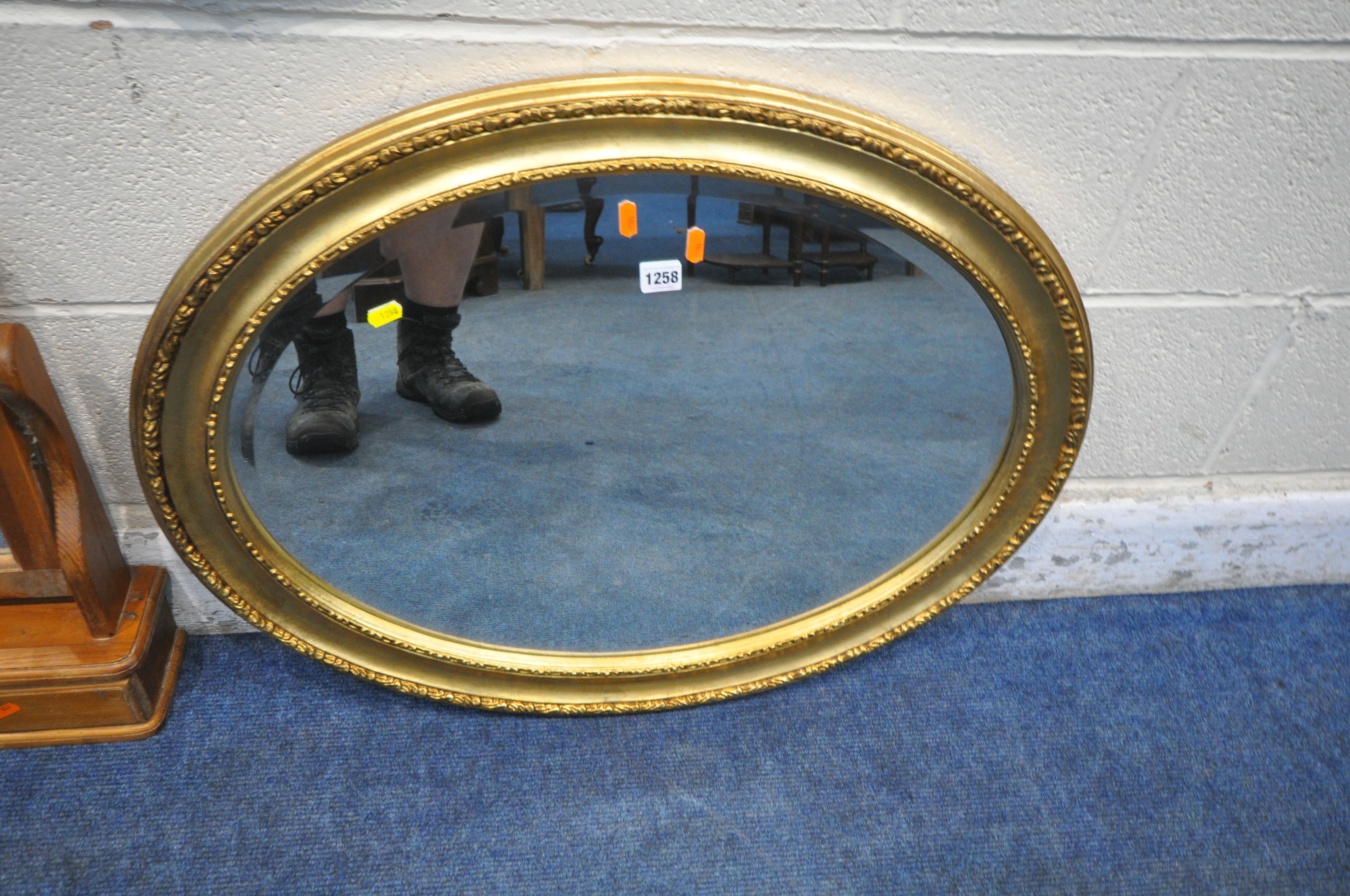 A GILT FRAMED OVAL BEVELLED EDGE WALL MIRROR, 80cm x 61cm, another gilt framed wall mirror and a - Image 2 of 3
