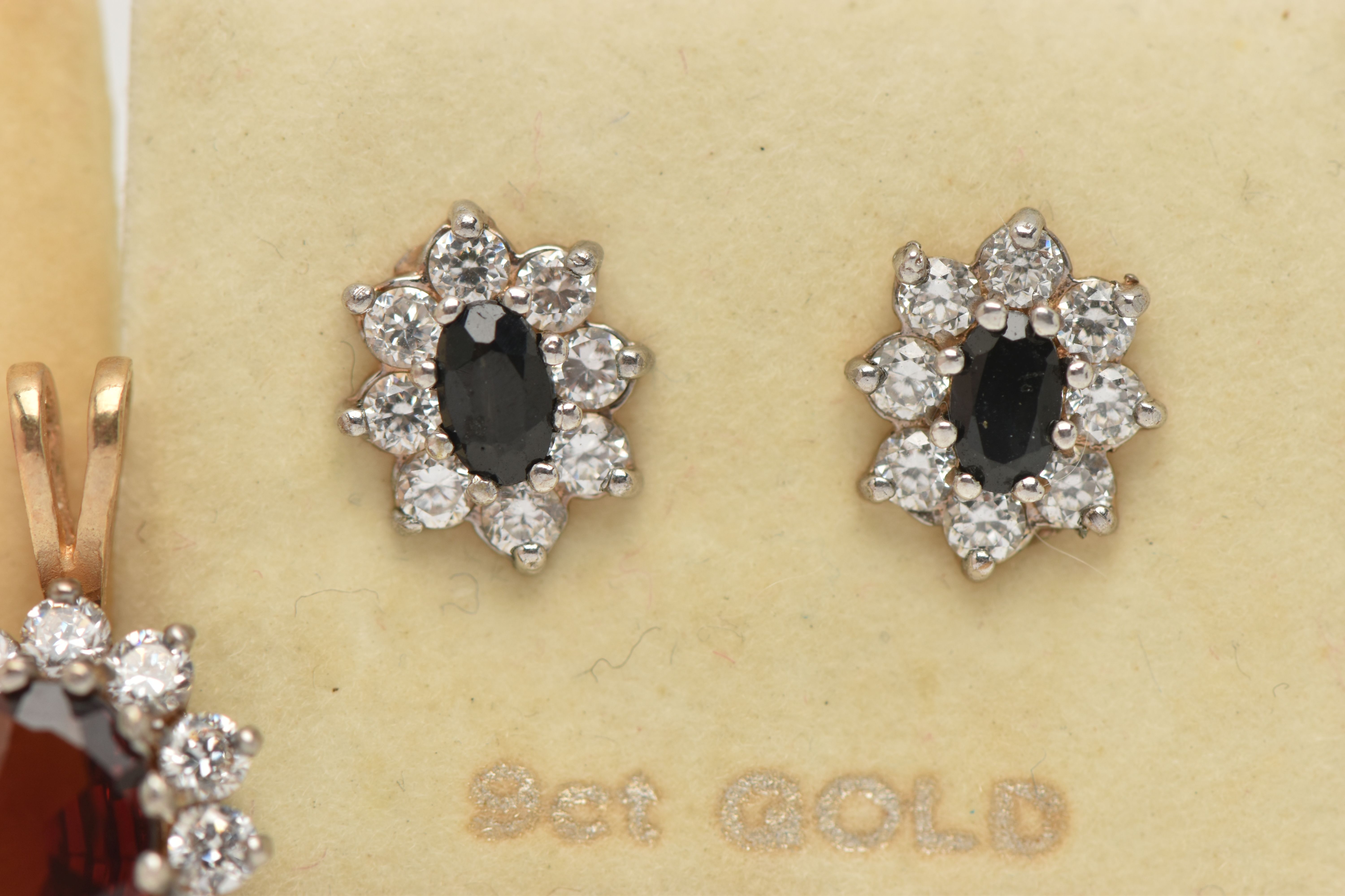 TWO PAIRS OF EARRINGS AND A PENDANT, the 9ct gold cluster pendant with central oval red gem assessed - Image 3 of 4