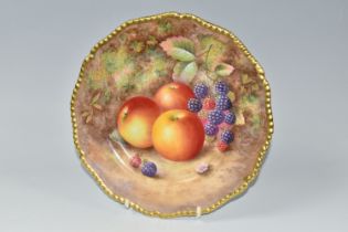 A ROYAL WORCESTER flower shaped cabinet plate, with gilt gadrooned edge, decorated with hand painted