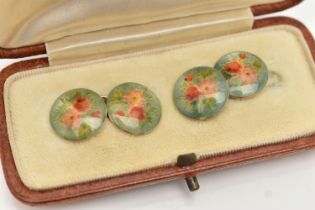 A PAIR OF ENAMEL CUFFLINKS, designed as circular panels with floral enamel decoration and chain link