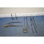 A PAIR OF VICTORIAN CAST IRON ANTI CLIMB SPIKES, a door handle, a chain pipe wrench, along with four