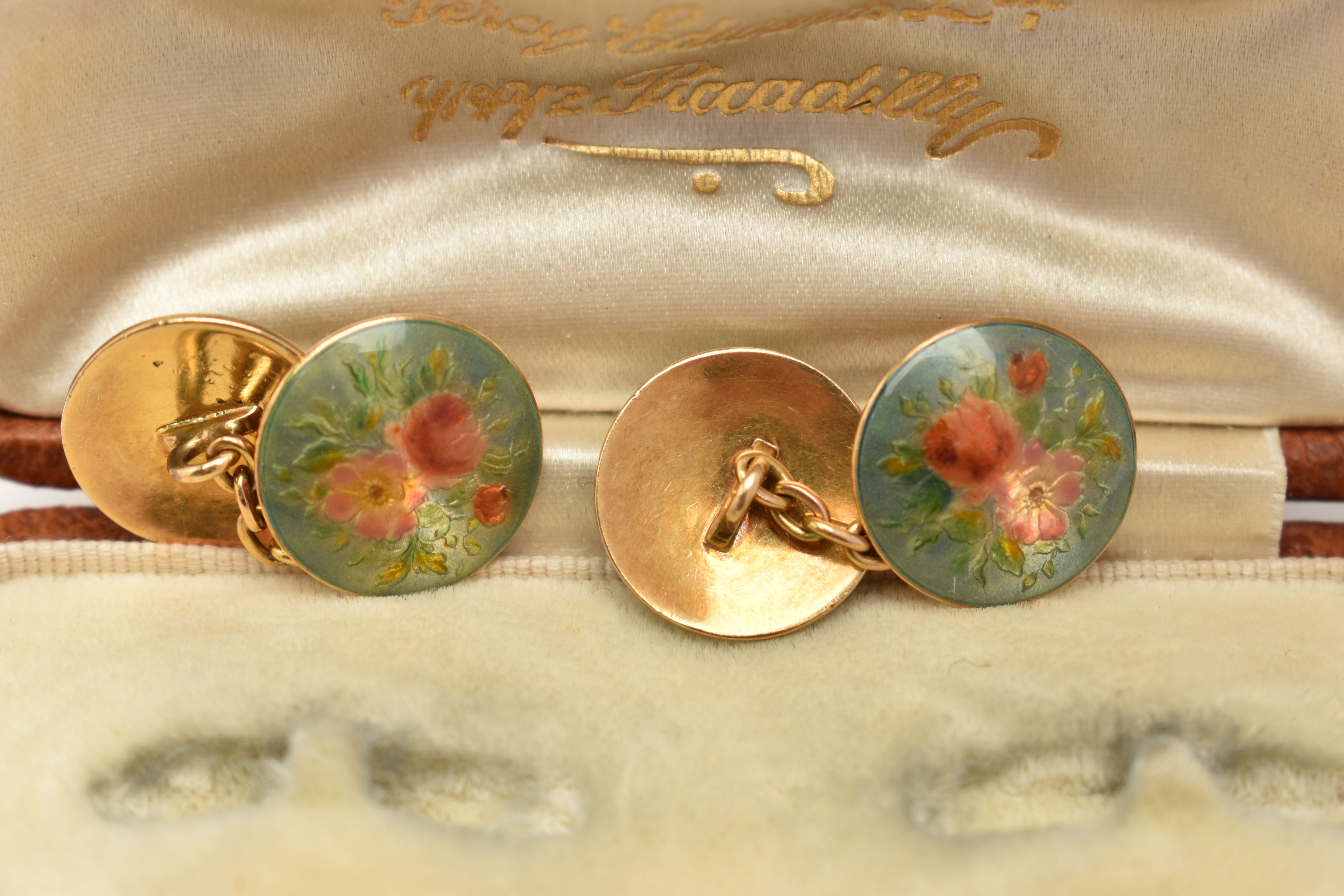 A PAIR OF ENAMEL CUFFLINKS, designed as circular panels with floral enamel decoration and chain link - Image 2 of 3