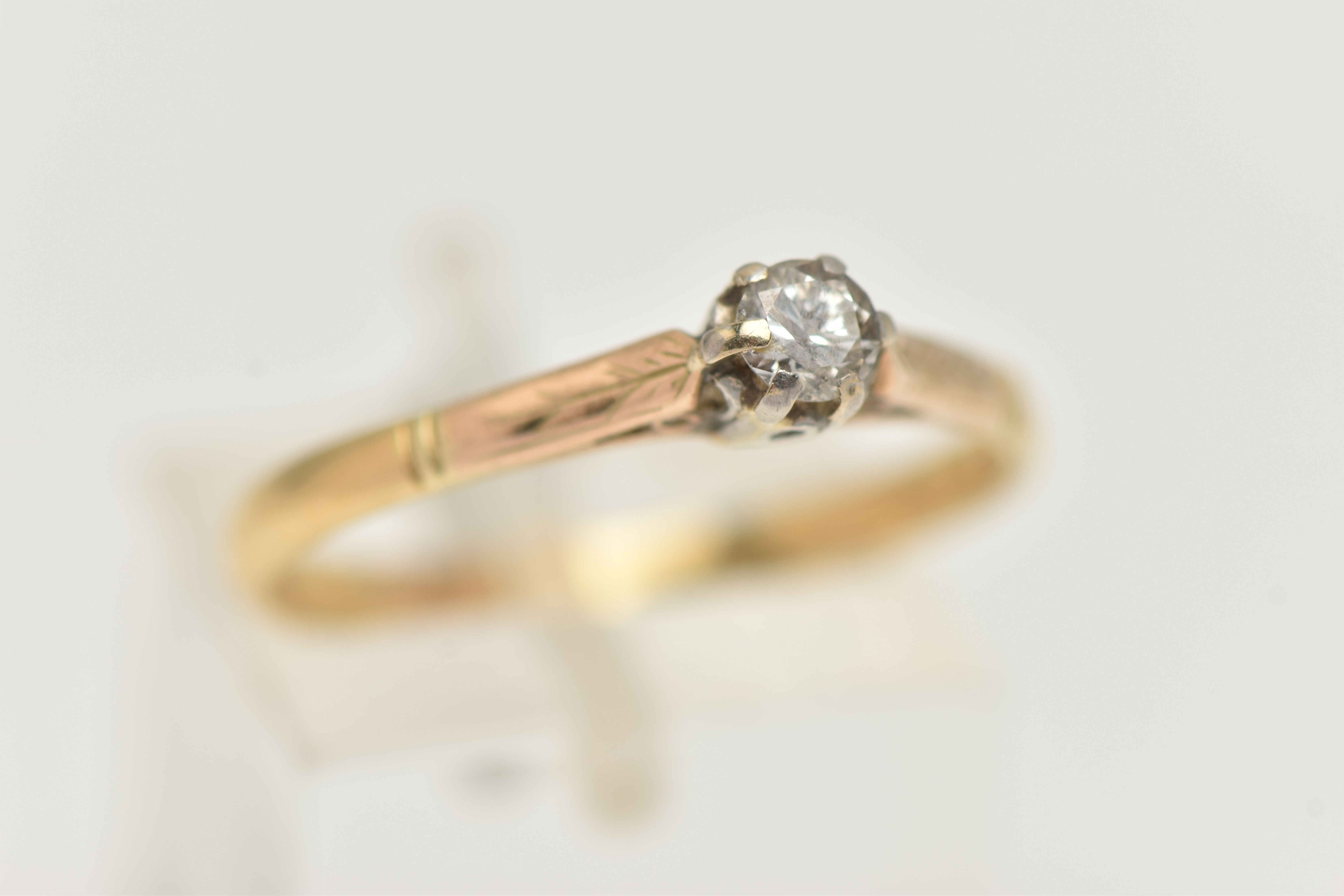 A YELLOW METAL DIAMOND SINGLE STONE RING, set with a round brilliant cut diamond, claw set, - Image 4 of 4