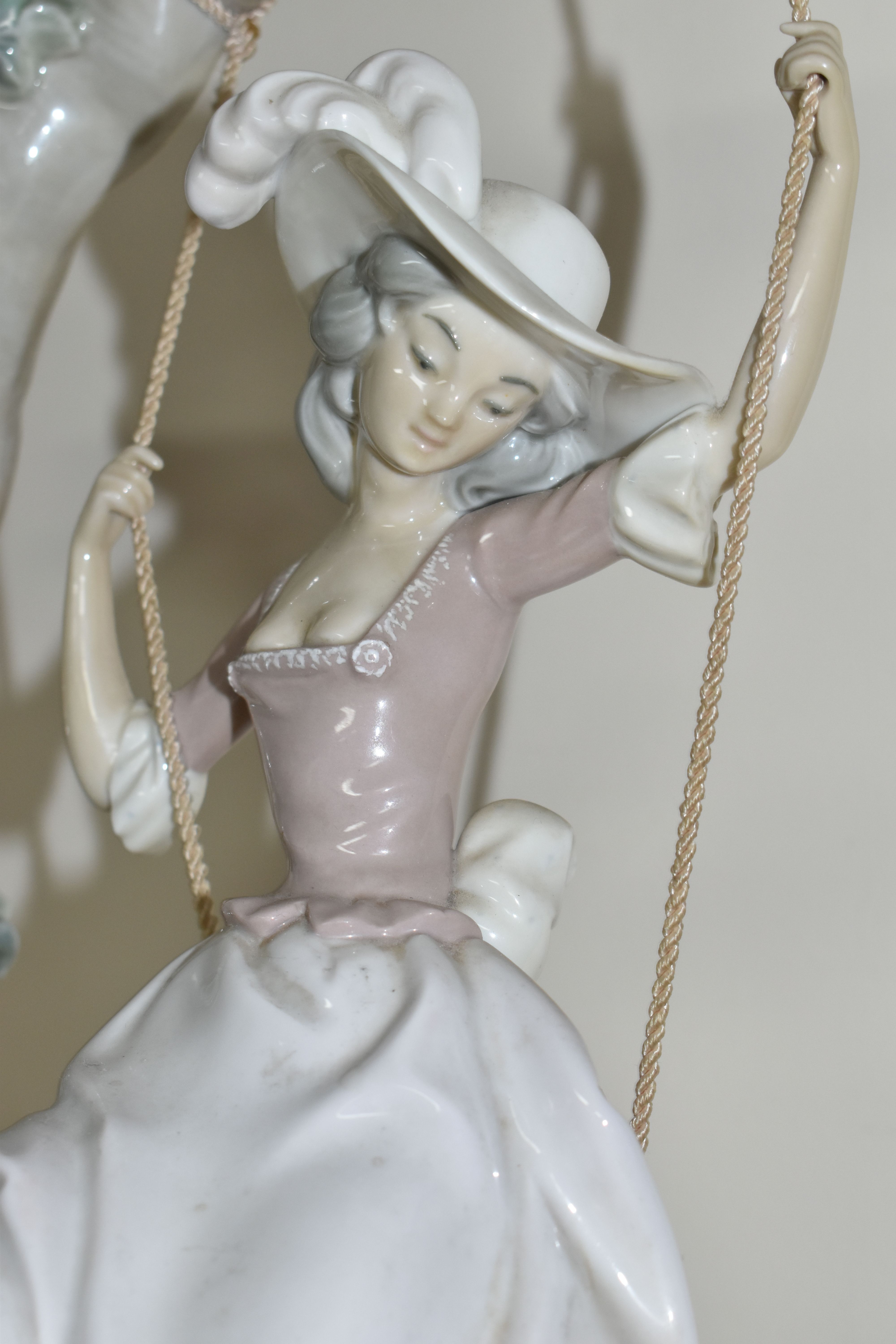 A LLADRO 'SWINGING' SCULPTURE OF A GIRL ON A SWING, model no 1297, sculptor Salvador Debon, issued - Image 6 of 7