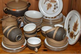 A GROUP OF DENBY 'COTSWOLD' DESIGN DINNERWARE, comprising two covered tureens, teapot, oval meat