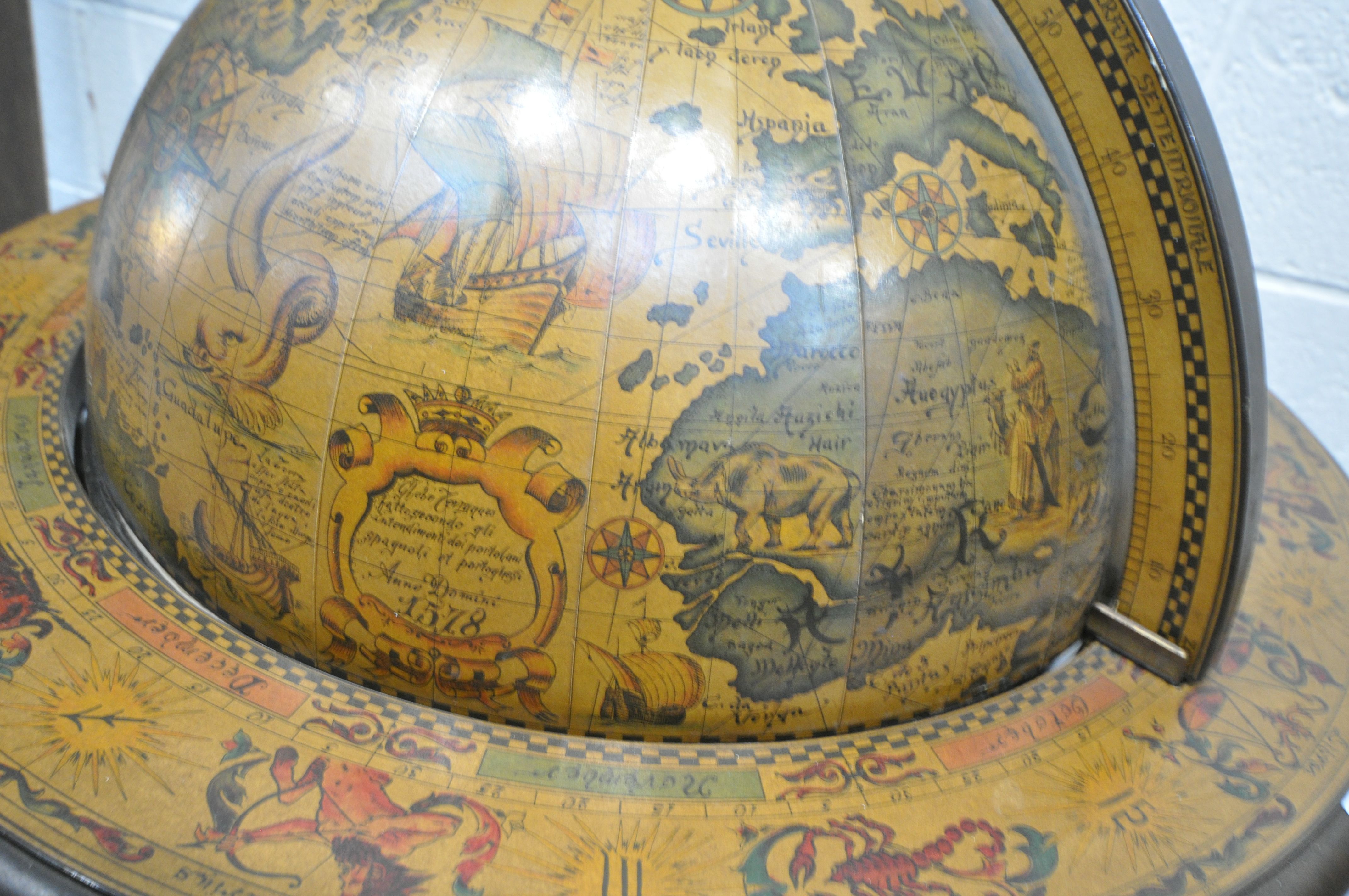 A 20TH CENTURY DRINKS GLOBE, with a hinged lid, enclosing a fitted interior, raised on spiral - Image 5 of 9