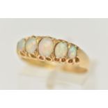 AN EARLY 20TH CENTURY, 18CT GOLD OPAL FIVE STONE RING, set with five graduated oval cut, opal