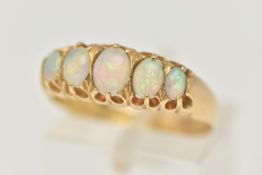 AN EARLY 20TH CENTURY, 18CT GOLD OPAL FIVE STONE RING, set with five graduated oval cut, opal