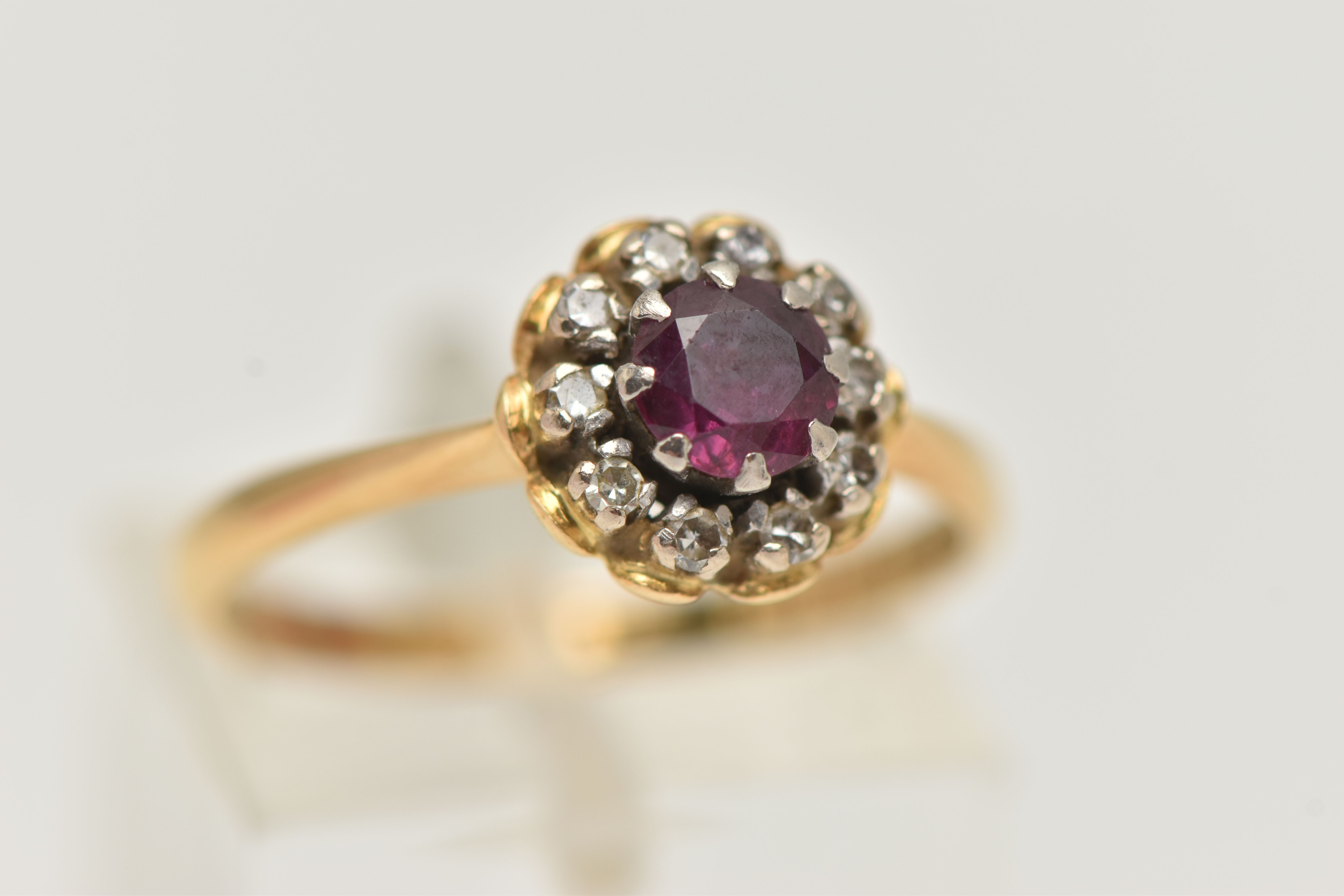 AN 18CT GOLD RUBY AND DIAMOND CLUSTER RING, of a circular form, centrally set with a circular cut - Image 4 of 4