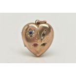 A YELLOW METAL HEART LOCKET PENDANT, floral pattern set with blue, red and colourless paste,