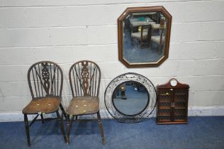 TWO 20TH CENTURY WHEEL BACK CHAIRS, a bevelled edge wall mirror, a circular wall mirror and a