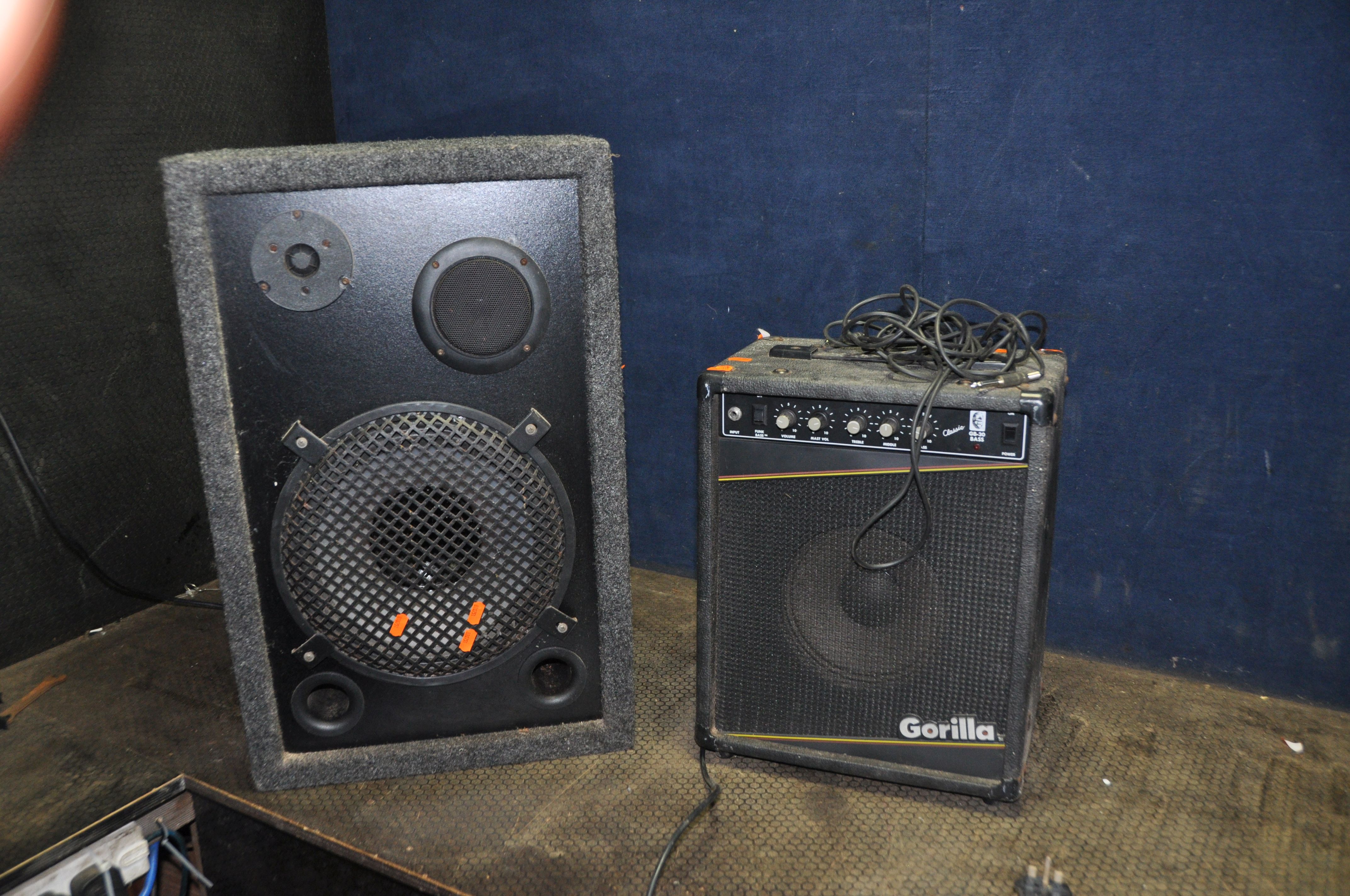 A GORILLA GB30 BASS GUITAR COMBO (PAT pass and working but input jack loose) and a 3 way PA