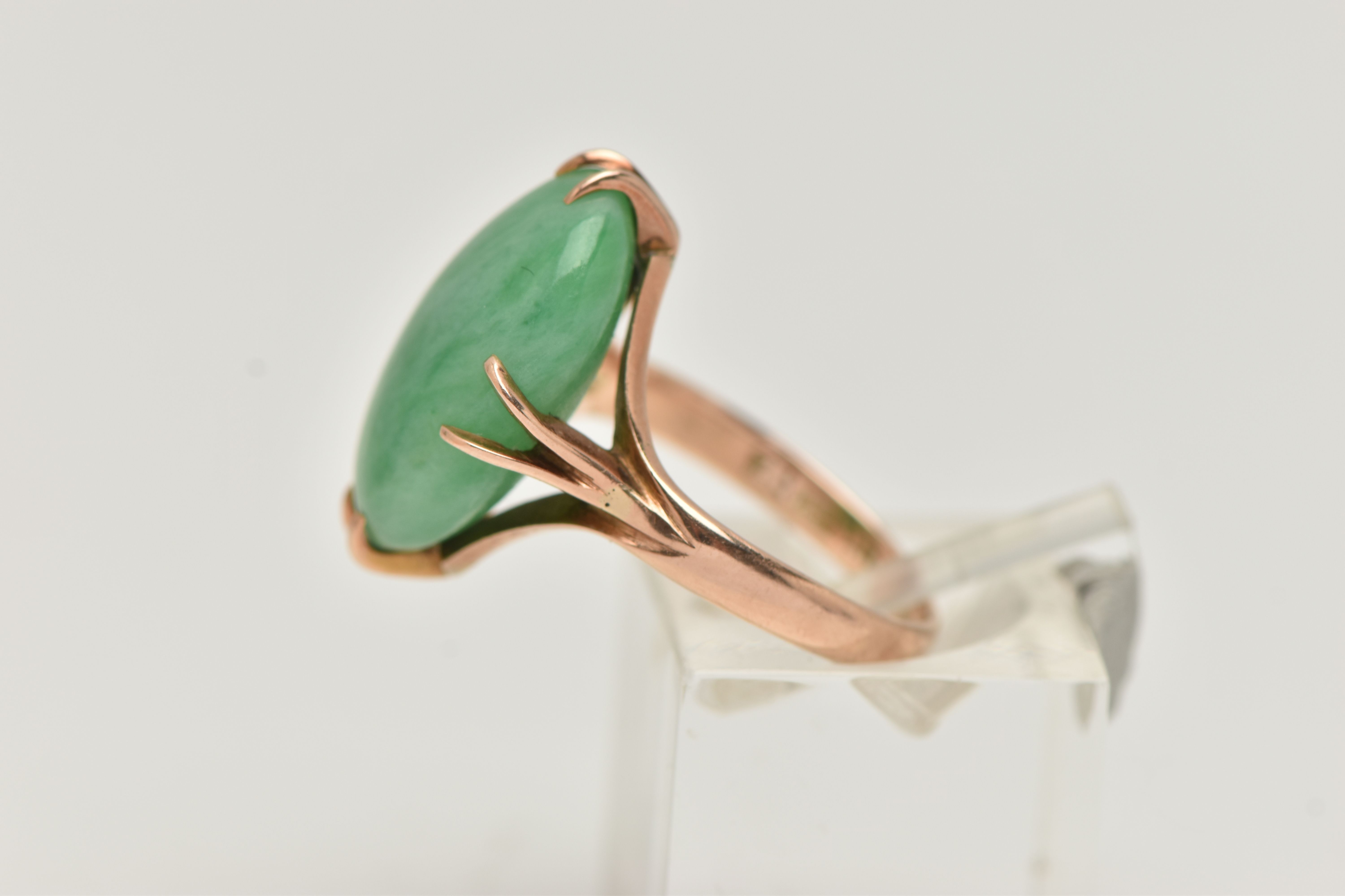 A CHINESE JADE CABOCHON RING, designed as an oval jade cabochon within an eight claw setting to - Image 2 of 4